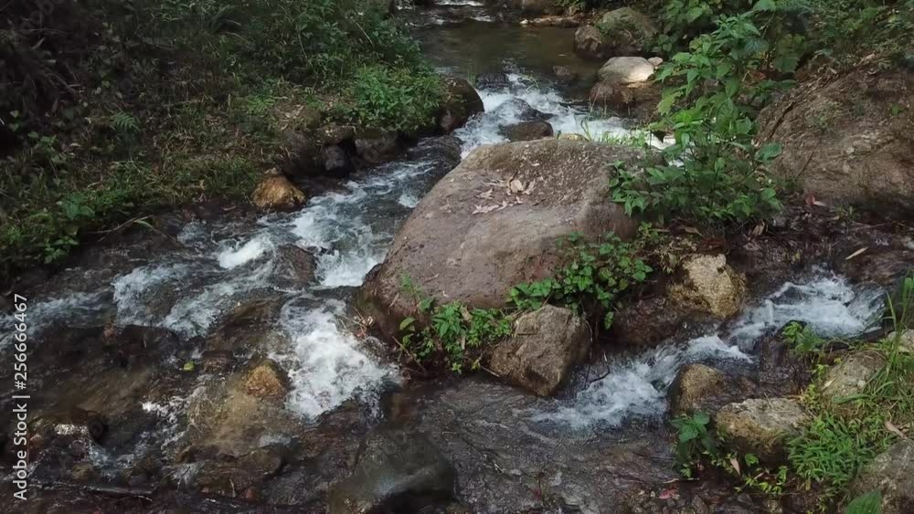 slow/low flyover of mountain stream slow/low flyover of mountain stream