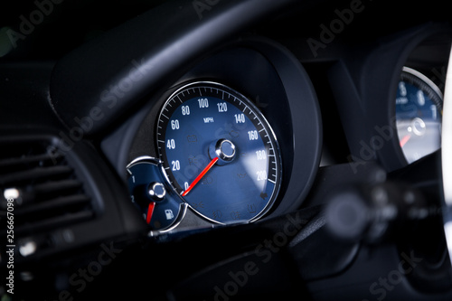 Blue speedometer in car