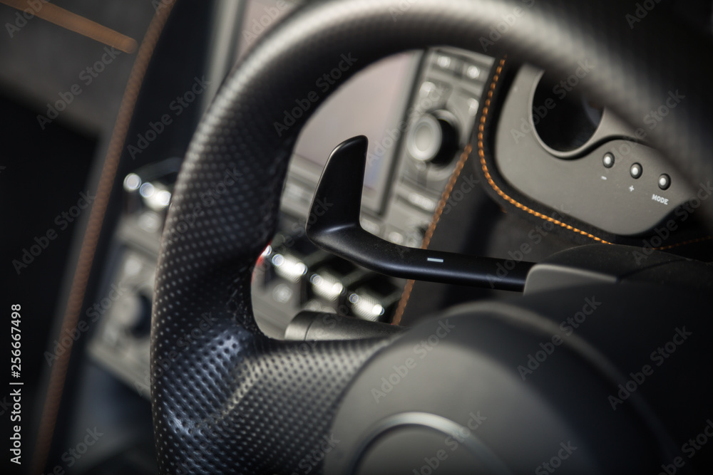 Paddle shifting in sports car steering wheel