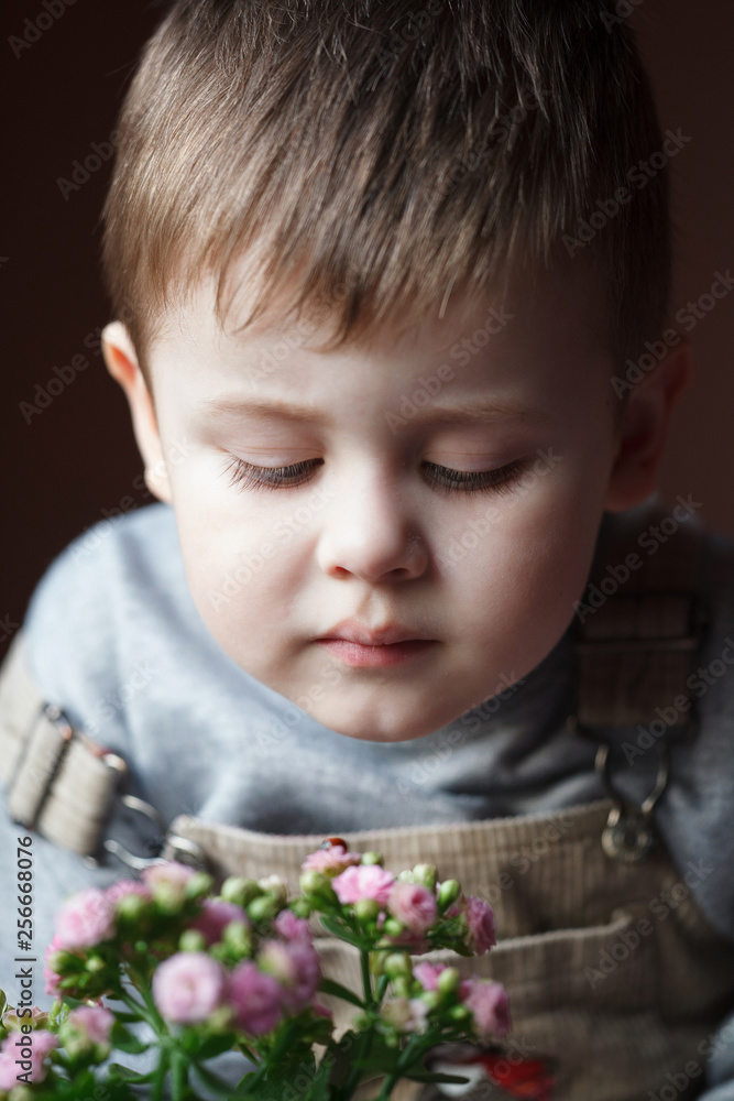 Portrait of adorable little boy starring at ladybug Portrait of adorable little boy starring at ladybug