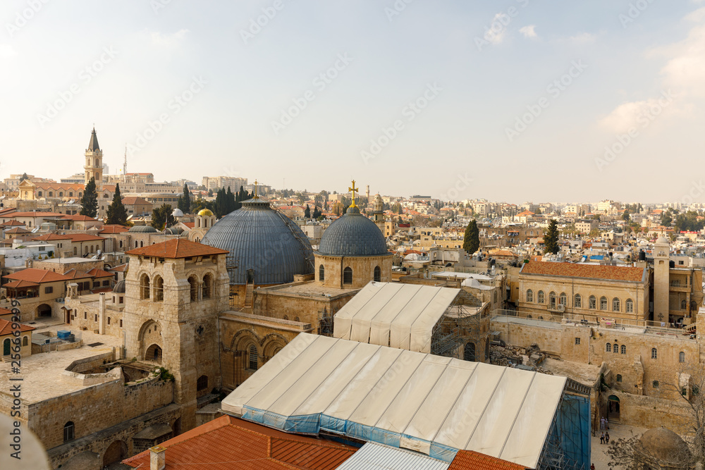Wide view from top on two domes and belfry of the Church of the Holy Sepulchre in Jerusalem