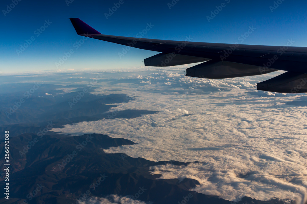 Fototapeta premium Clouds sky looking from the plane