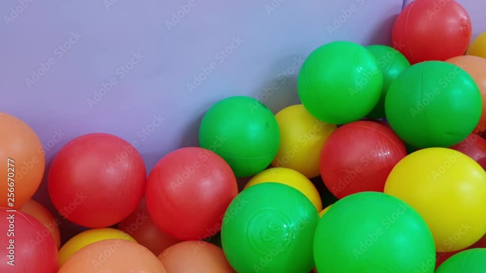 Sliding into colored plastic balls pool Sliding into colored plastic balls pool