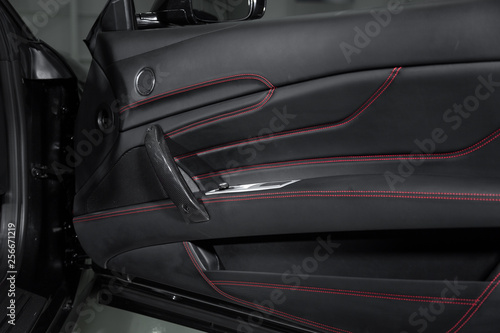 Leather trim car door panel © camerarules