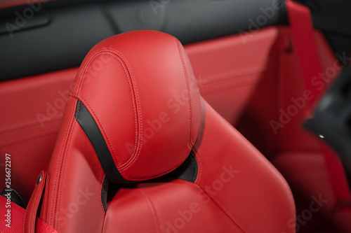 Red leather headrest of car seat © camerarules