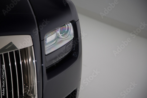 Close up of headlight on luxury car