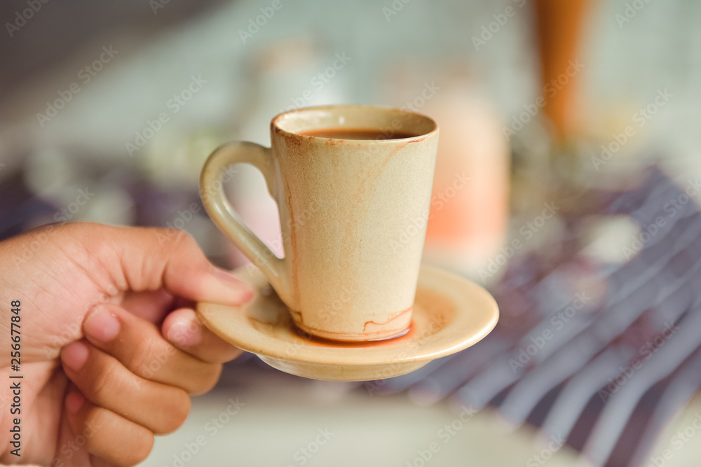 Espresso cup on the background of coffee machines, black coffee morning on coffee maker Espresso cup on the background of coffee machines, black coffee morning on coffee maker