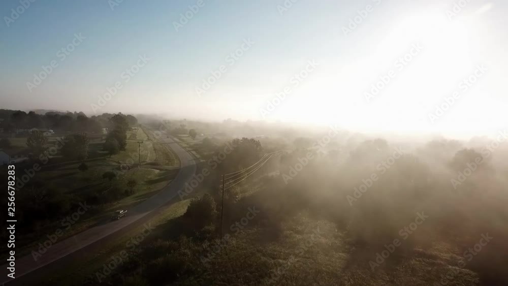 Flying through the fog near a rural highway in the Missouri Ozarks. Flying through the fog near a rural highway in the Missouri Ozarks.