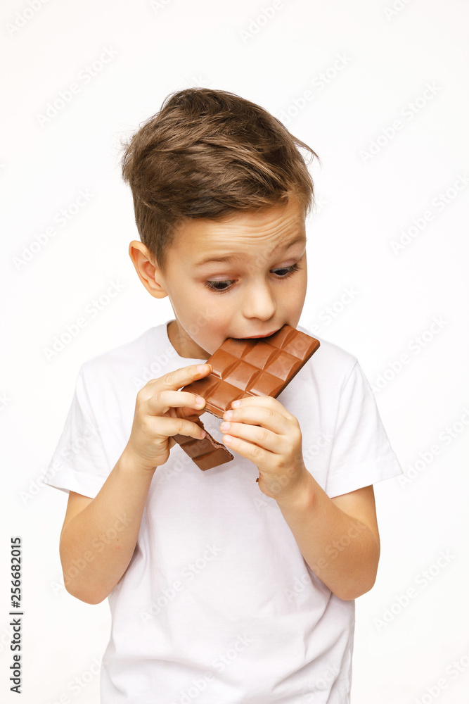 little beautiful boy holding chocolate studio shot little beautiful boy holding chocolate studio shot
