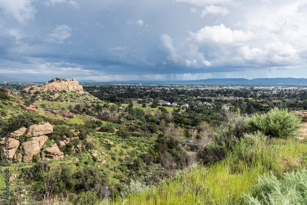 Naklejka premium Scenic view of spring storm clouds, Stoney Point Park and the San Fernando Valley near Topanga Canyon Blvd, Porter Ranch and Chatsworth in the City of Los Angeles, California.