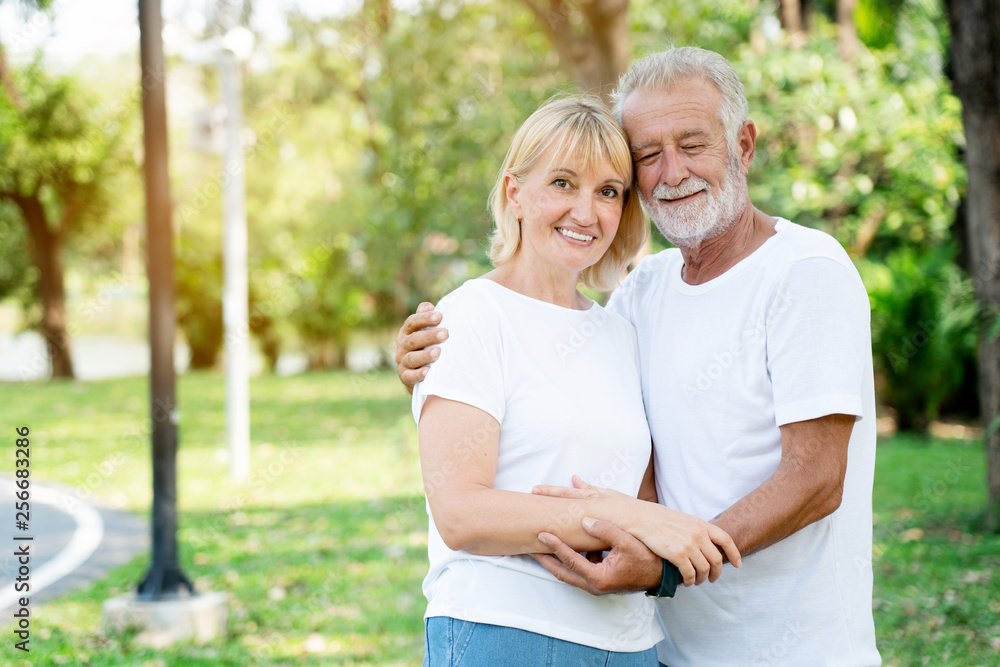 Senior Caucasian Women and men Standing in garden during summer Which is lover who has been caring for long time Take care of health And travel together in retirement Concepcion insured the elderly Senior Caucasian Women and men Standing in garden during summer Which is lover who has been caring for long time Take care of health And travel together in retirement Concepcion insured the elderly