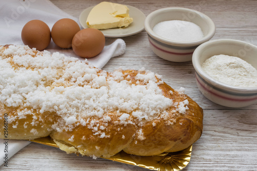 Braided bread, typical Easter dessert with the ingredients to make it