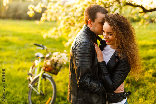 Portrait of attractive couple in leather jacket.