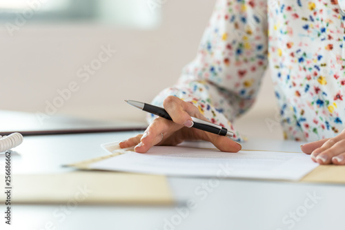 Businesswoman proofreading a contract photo