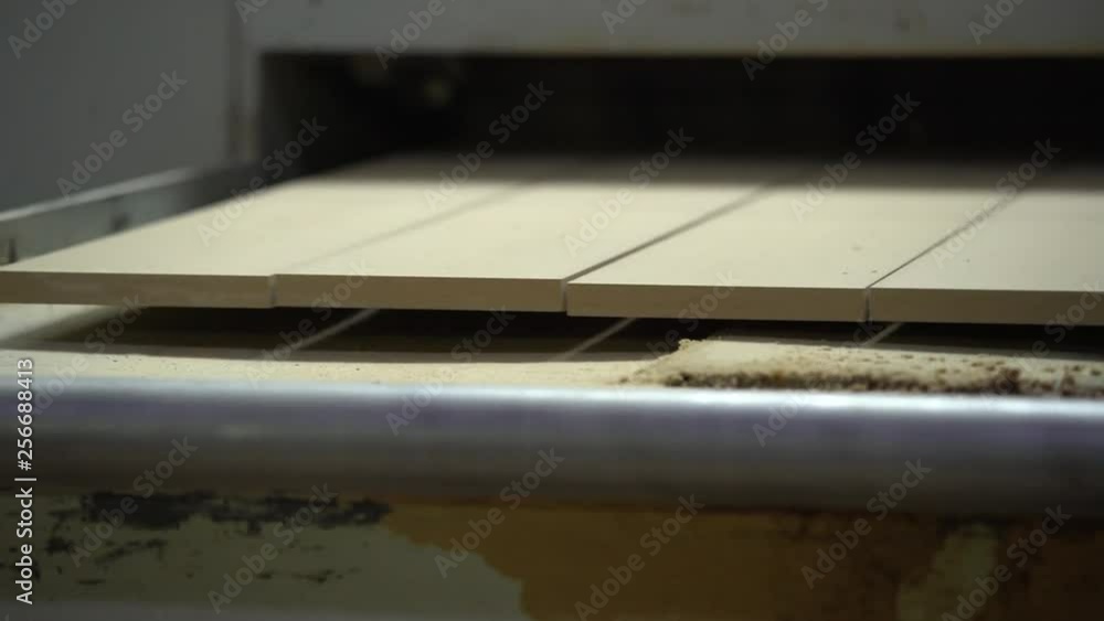 Shooting of production of plinths. Plinths. Production. Processing. Close up. Conveyor. Shooting of production of plinths. Plinths. Production. Processing. Close up. Conveyor.
