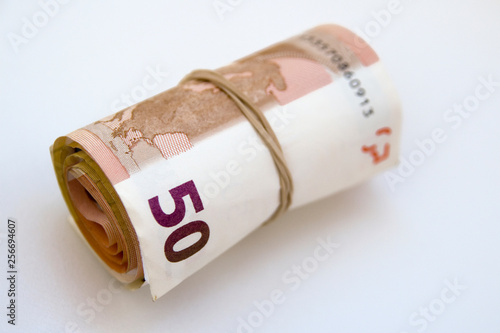 Rolled up euro banknotes