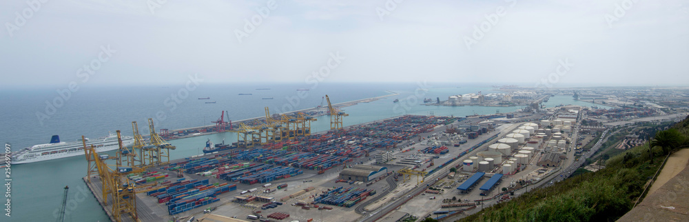 Aerial view of cargo ships loading containers at seaport