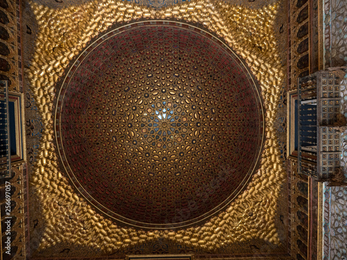 Seville, Spain - March, 2018: Beautiful hall of Ambassadors in the Royal palace of Alcazar Seville Andelusia Spain photo