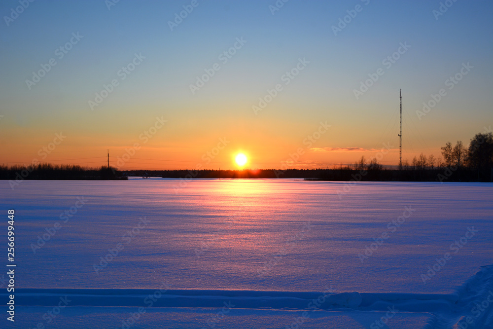 winter sunset over the field