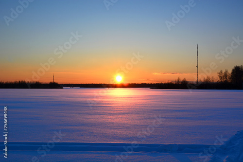 winter sunset over the field © kapella87