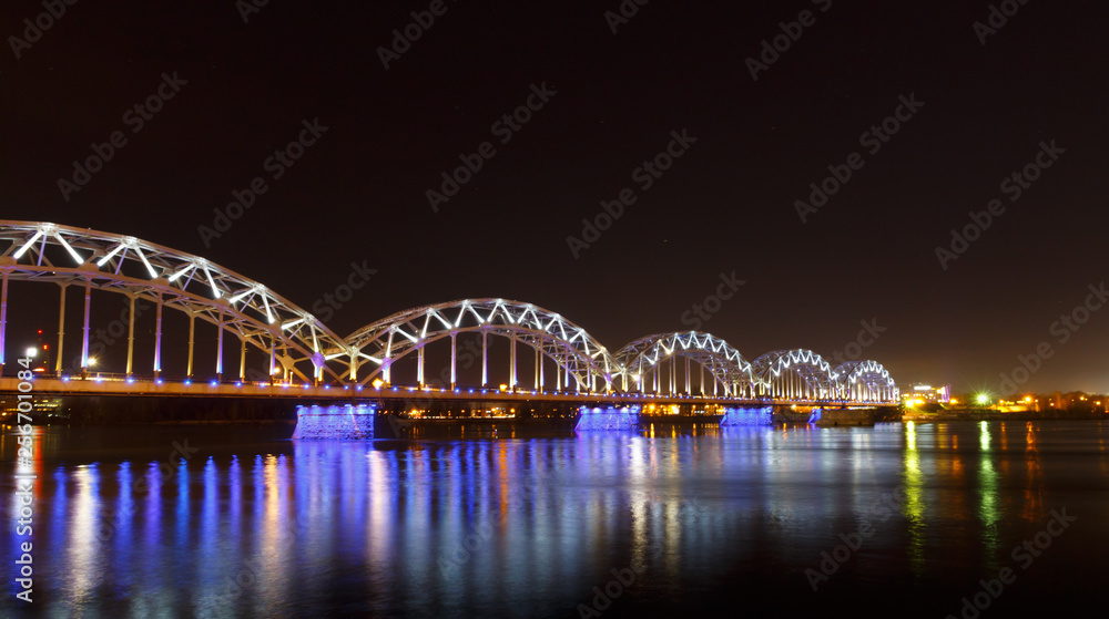 Railway bridge at night in winter, Riga