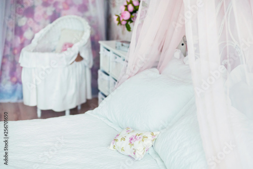 bedroom with white and pink bedding