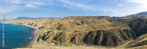 Clay hills and ravines as a result of soil erosion. photo