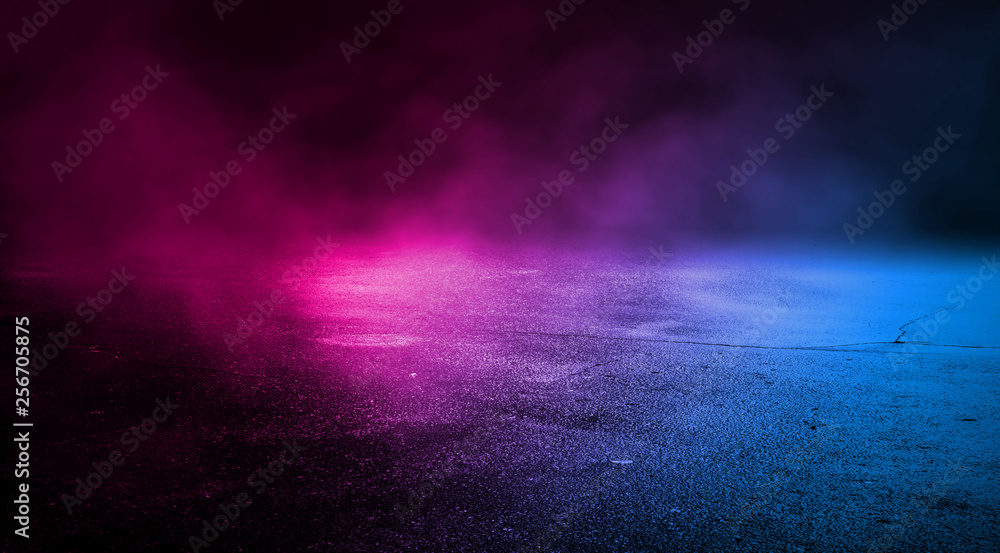 Background empty street at night. Wet asphalt, reflection of neon multi-colored light. Fog, smoke Background empty street at night. Wet asphalt, reflection of neon multi-colored light. Fog, smoke
