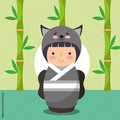 japanese kokeshi doll in kimono animal costume