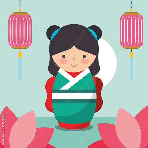 floral decoration chinese lanterns and japanese kokeshi doll in kimono