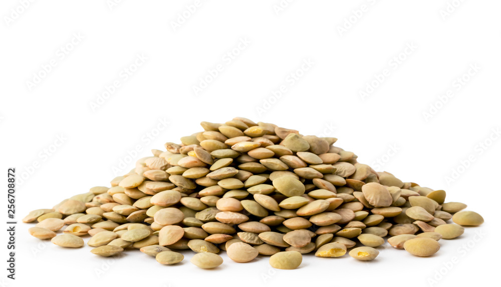Heap of dry lentils closeup on a white. Isolated. Heap of dry lentils closeup on a white. Isolated.
