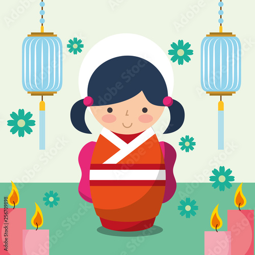 floral decoration chinese lanterns and japanese kokeshi doll in kimono