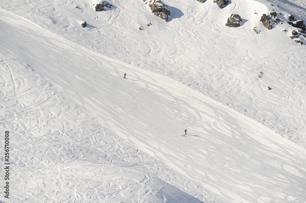 Obraz premium Skiing people in winter at ski slope