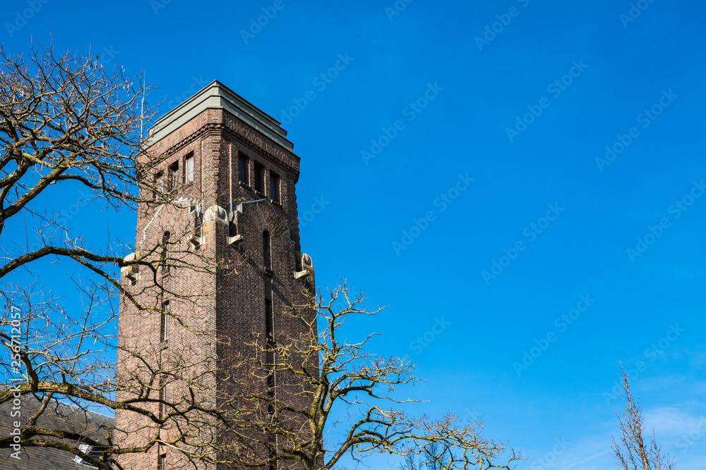 tower of church in Dordrecht, The Netherlands. Blue sky, space for text