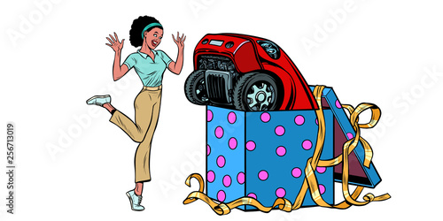 car holiday gift box. African woman funny reaction joy. isolate on white background
