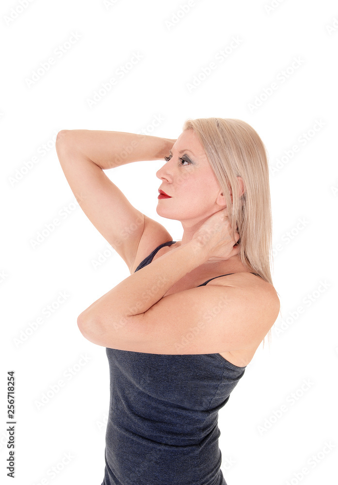 Gorgeous woman standing in profile waist up Gorgeous woman standing in profile waist up