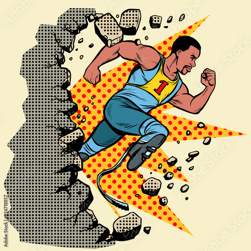 breaks the wall. disabled African runner with leg prostheses running forward. sports competition