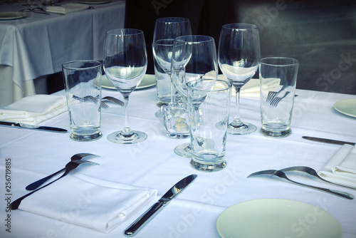 dinner setting plate and glass napkin cutlery tableware empty place romantic restaurant table