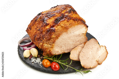 Roast pork loin, Christmas baked spicy galzed meat, close-up, isolated on white background