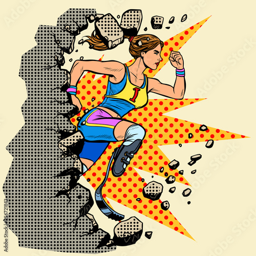 breaks the wall disabled woman runner with leg prostheses running forward. sports competition