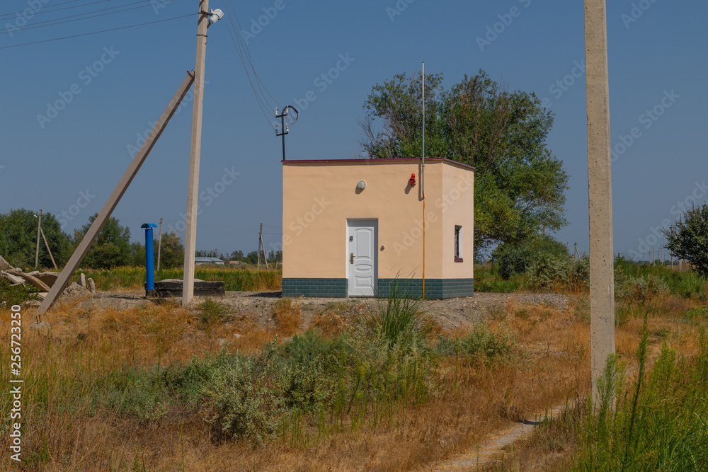 Industrial zone in the steppe. Industrial building in the steppe.