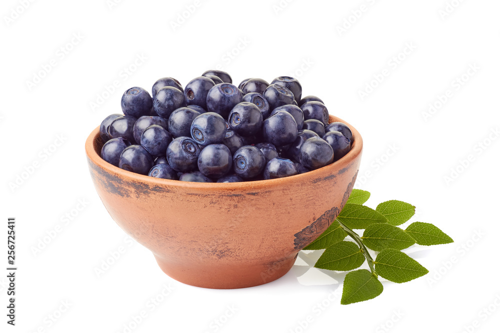 Fresh blueberries in ceramic bowl on white Fresh blueberries in ceramic bowl on white