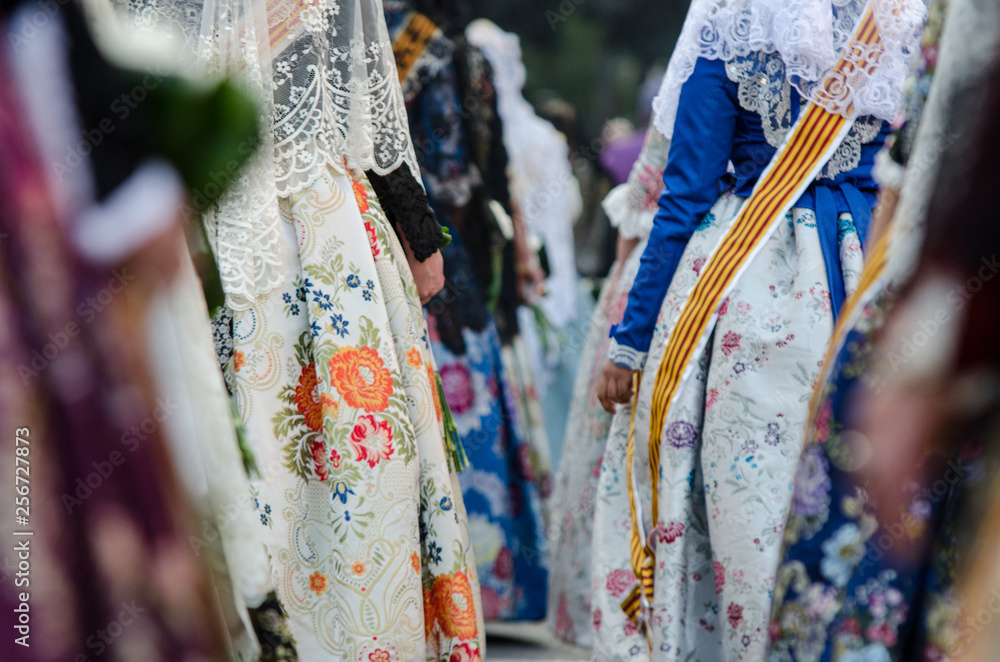 Falleras dress traditional with flowers, Spain, Valencia. Fashion fallas festival in Valencia.