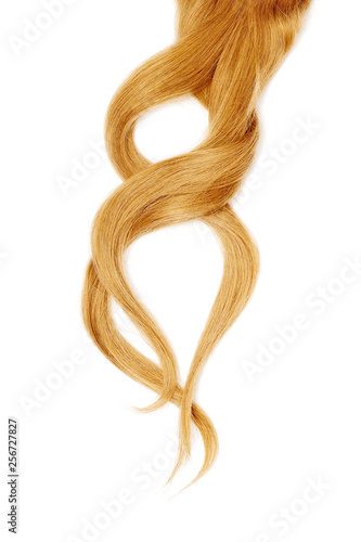 Blond hair in shape of numeral eight, isolated on white background