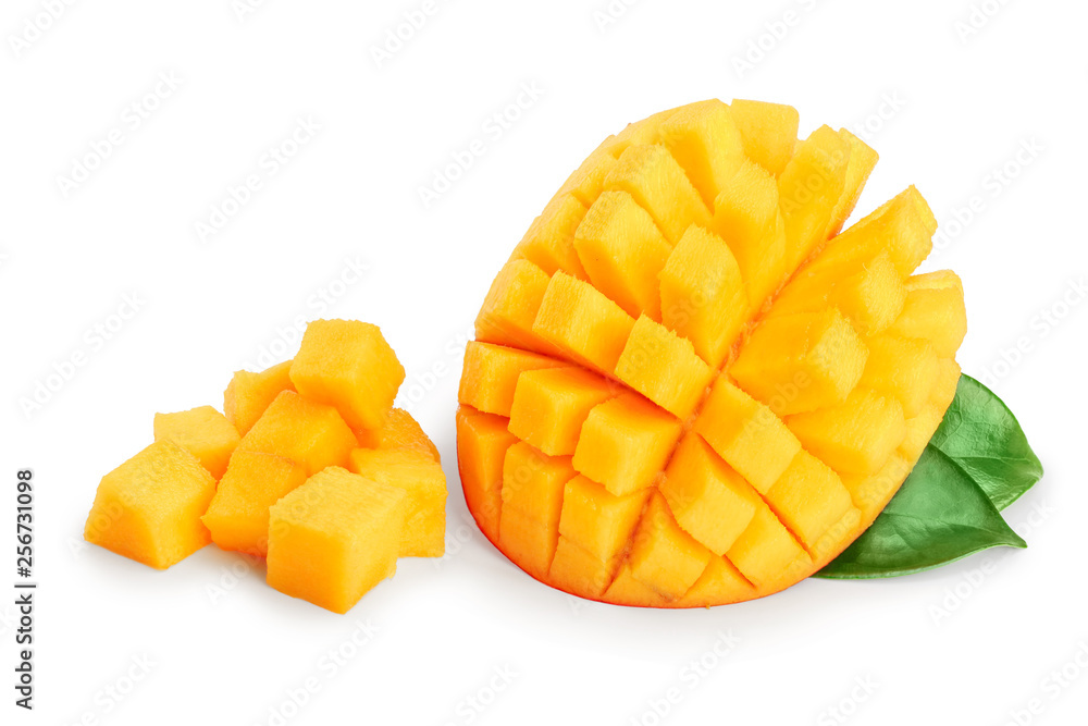 Mango fruit half with leaves and slices isolated on white background close-up