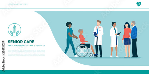 Seniors with team of professional caregivers and doctors