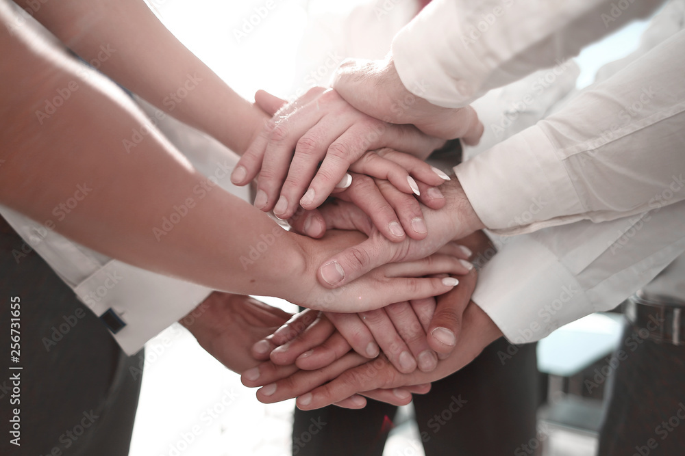 Stack of hands - real people agreement Stack of hands - real people agreement