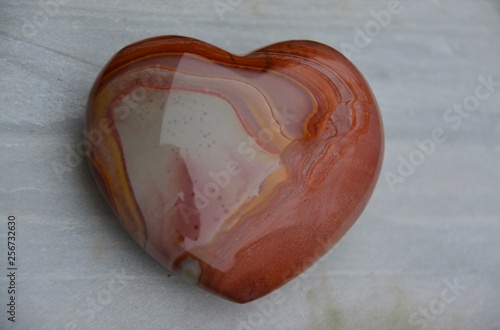 Mookaite Jasper stone. Healing polished crystal used for chakra balance. photo