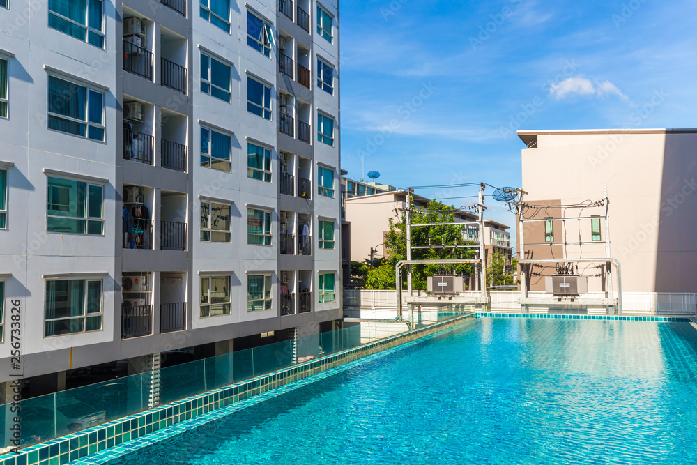 Low rise 8 floor modern condominium building with swimming pool