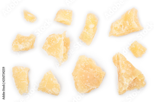 Parmesan cheese pieces isolated on white background. Closeup. Top view. Flat lay